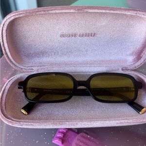 Miu Miu Black Sunglasses with Olive Lenses